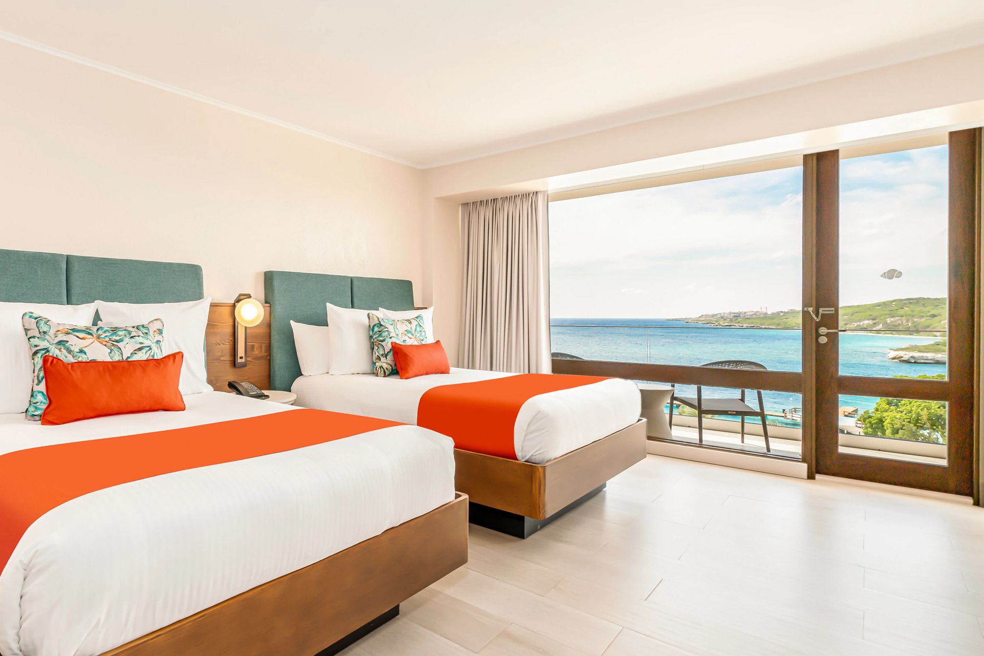 Guest room at Dreams Curaçao Resort, Spa & Casino