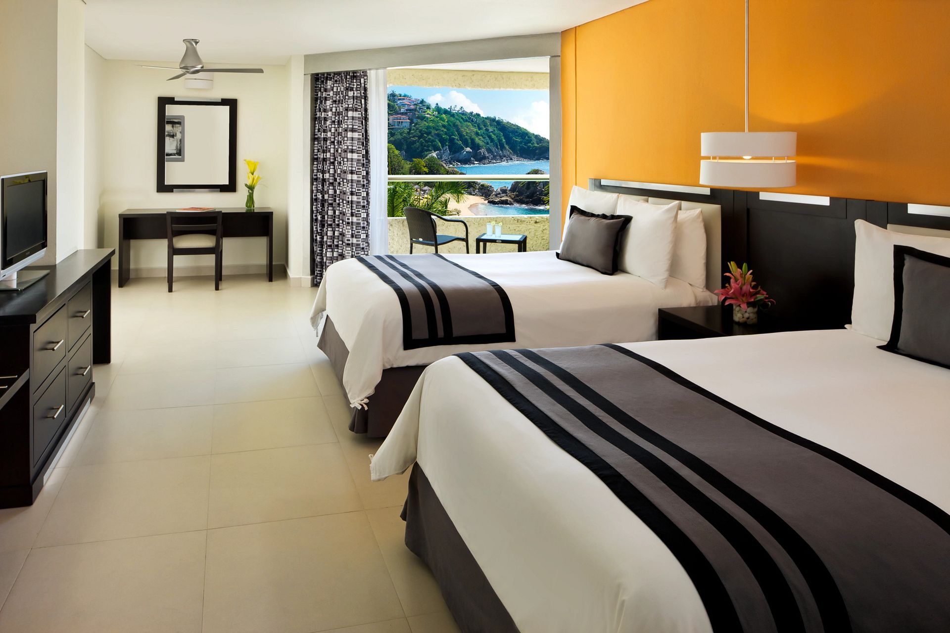 Guest room at Dreams Huatulco Resort & Spa