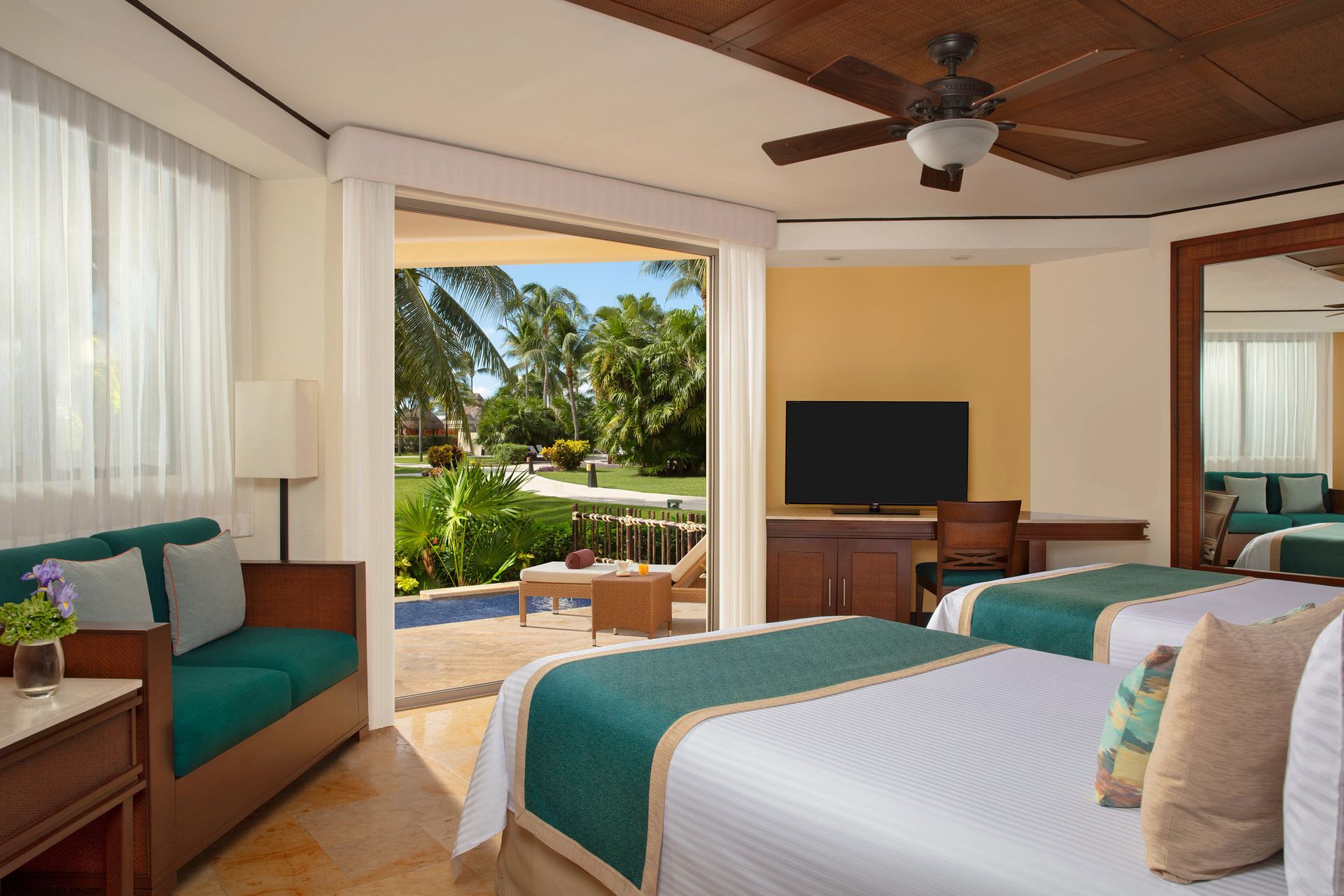 Guest room at Dreams Riviera Cancun Resort & Spa