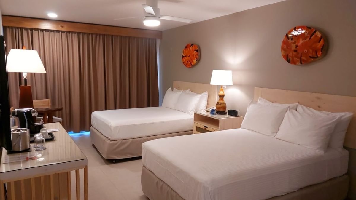 Renovated Fiesta Double room with modern decor, eco-friendly amenities, and garden views