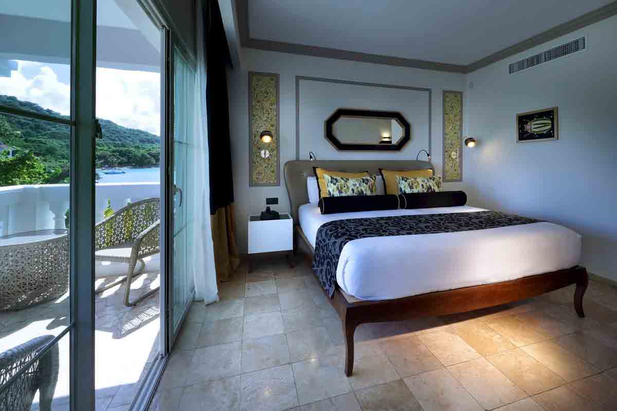 Main swimming pool at Grand Palladium Lady Hamilton, one of Jamaica largest pools at 4,500 square meters with four integrated jacuzzis and swim-up bar