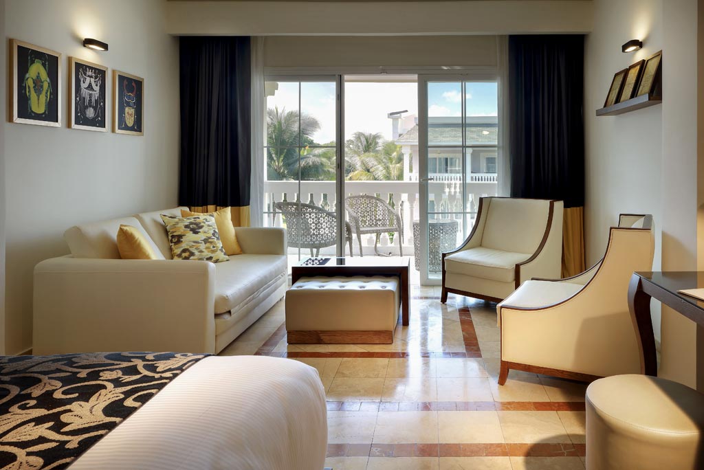 Suite at Grand Palladium Lady Hamilton with separate bedroom and living area, two terraces, and hydro-massage bathtub