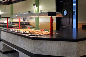 Las Torres main buffet restaurant with international show-cooking stations, themed dinner nights, and expansive seating area