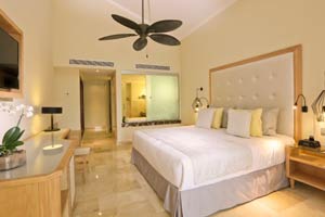 Deluxe Garden View room with king bed, memory foam mattress, flat-screen TV, minibar, and garden-view balcony