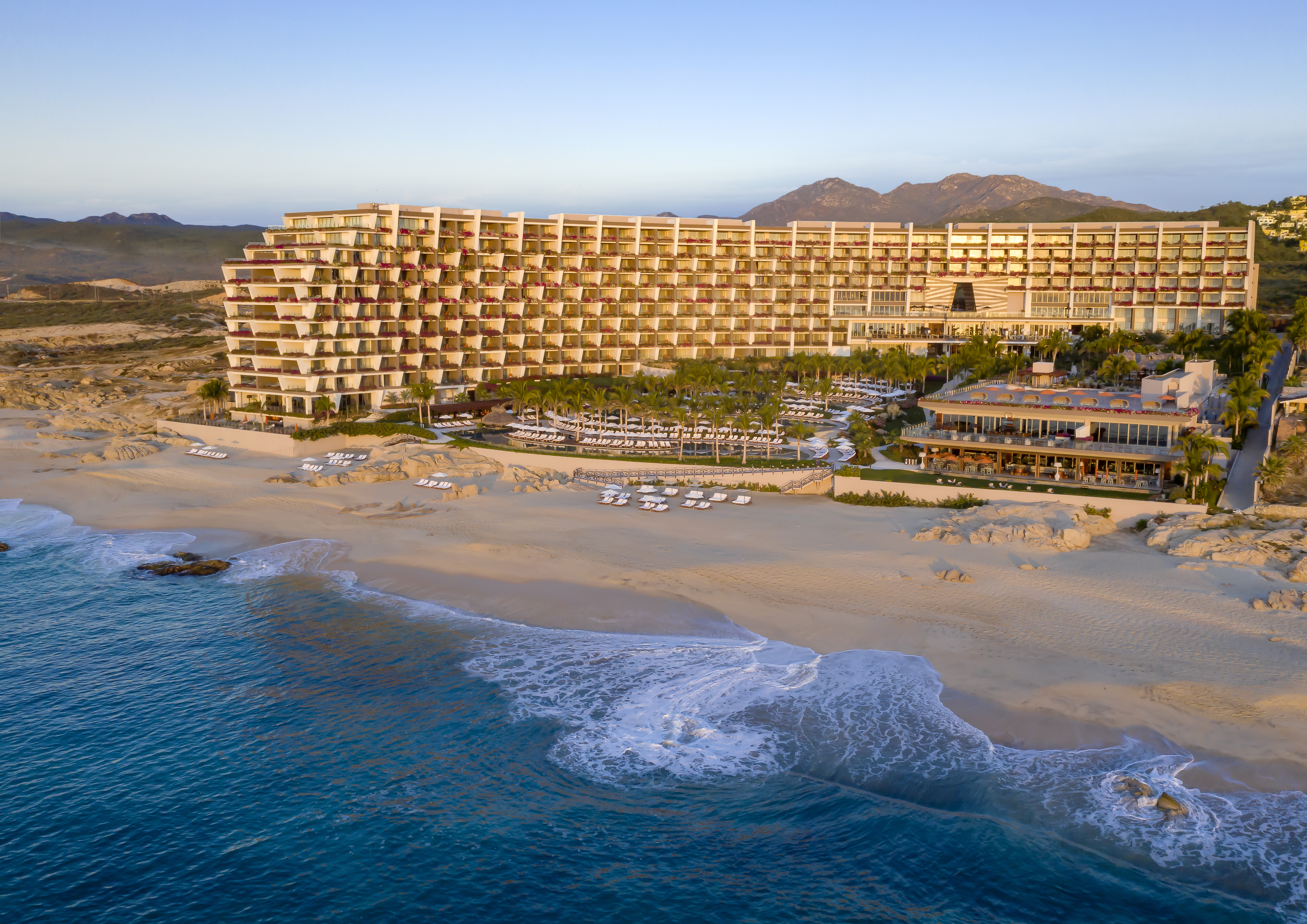 Grand Velas Los Cabos at golden hour overlooking the Sea of Cortez
