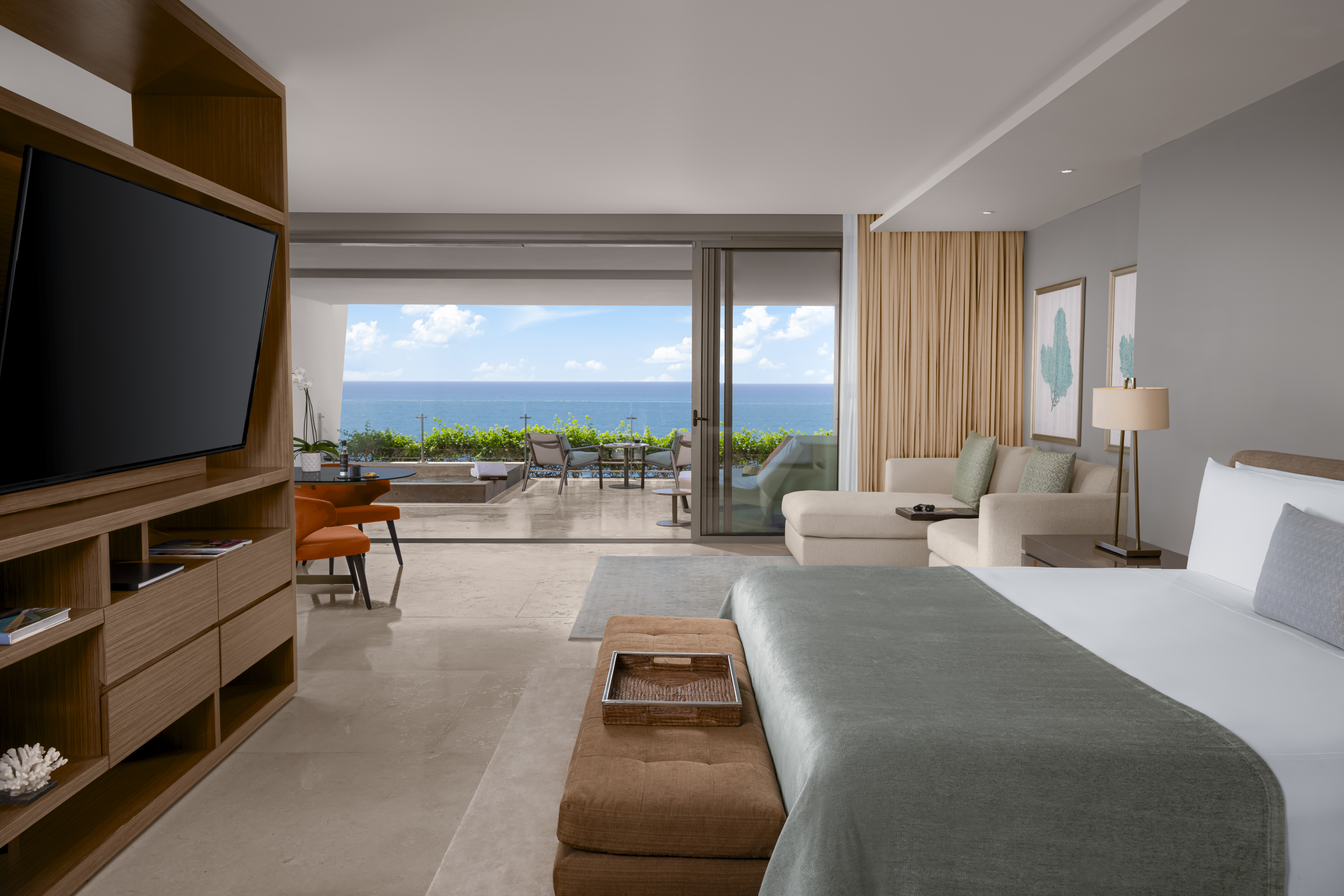 Grand Class Suite bedroom with ocean views and luxury amenities