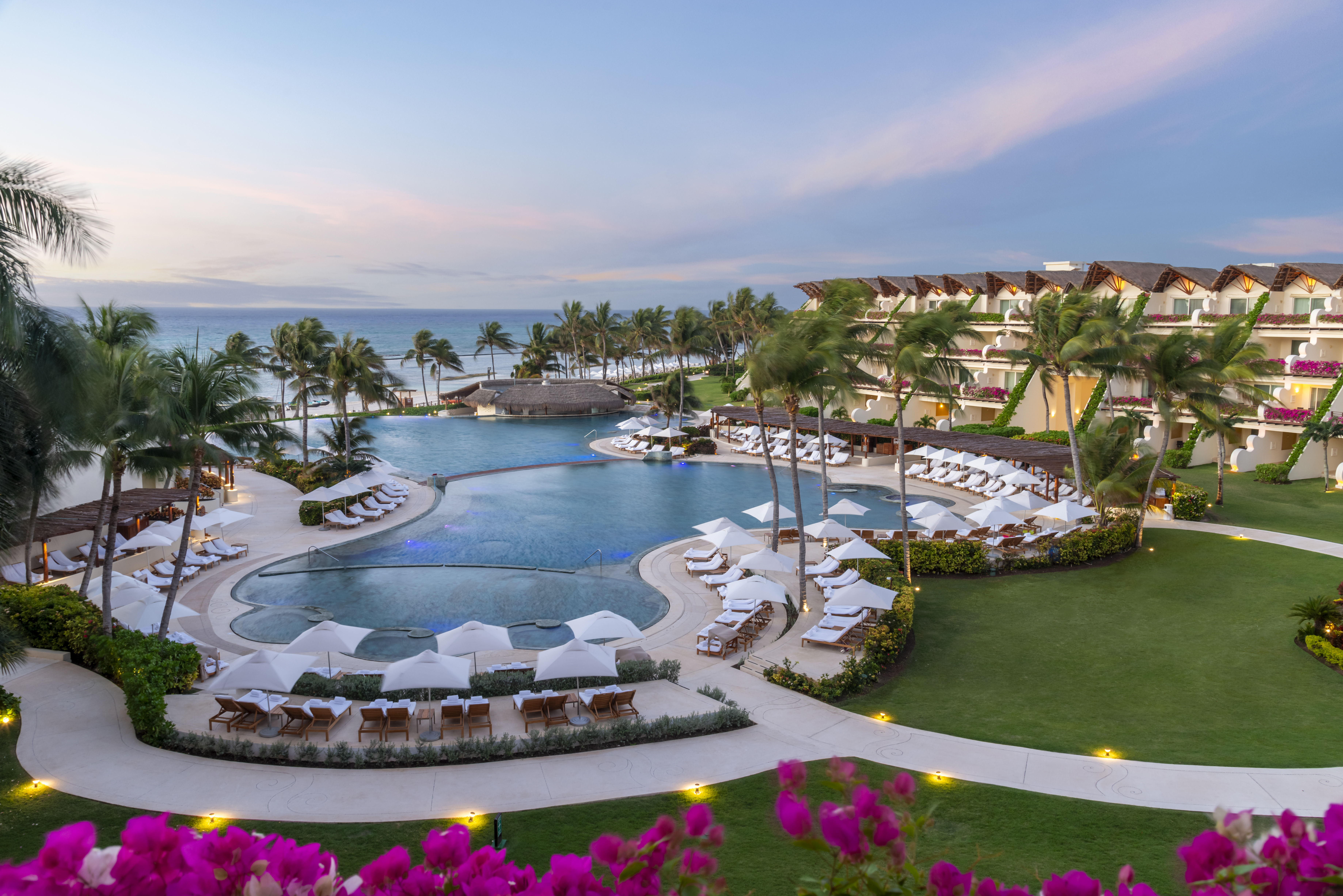Three-tiered Ambassador infinity pool with ocean views
