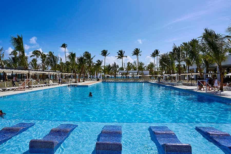 Swimming pool area at Hotel Riu Bambu