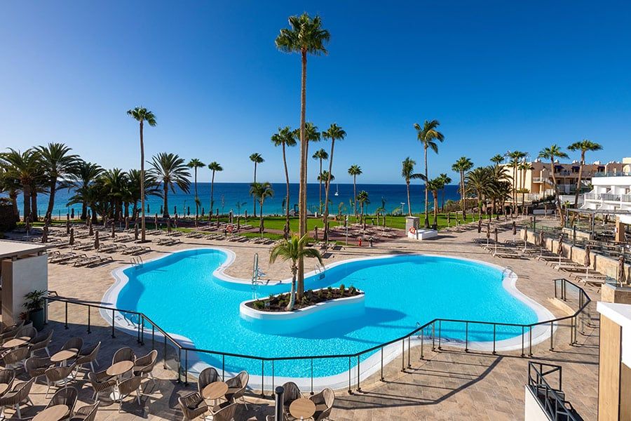 Swimming pool area at Hotel Riu Calypso