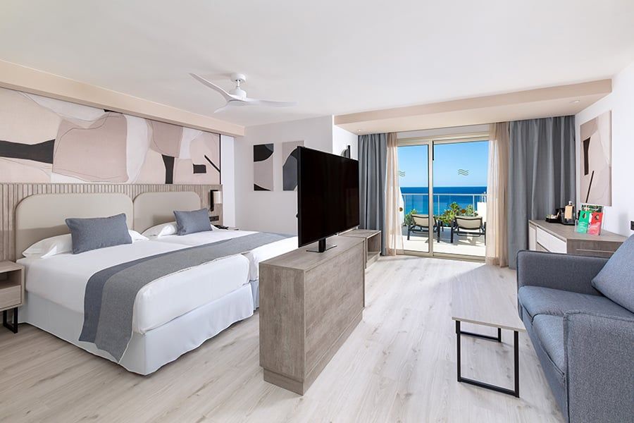 Guest room at Hotel Riu Calypso