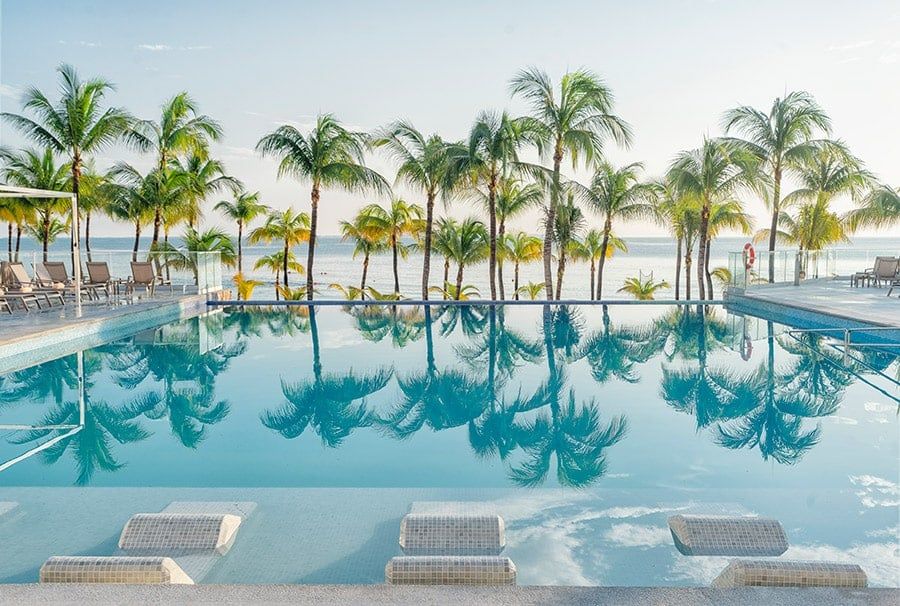 Swimming pool area at Hotel Riu Caribe