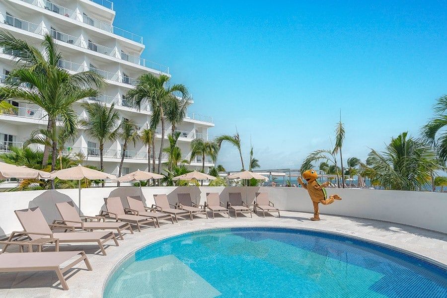 Swimming pool area at Hotel Riu Caribe