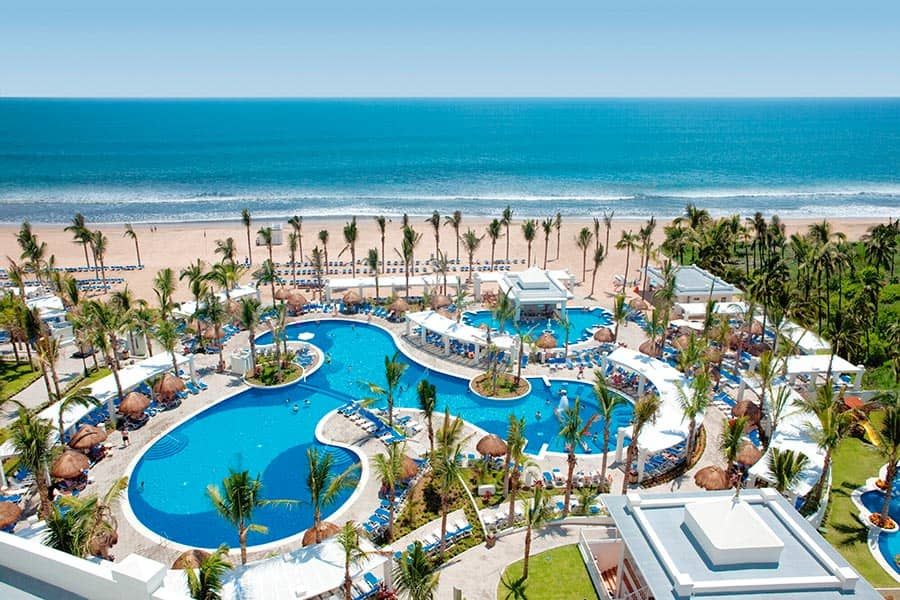 Swimming pool area at Hotel Riu Emerald Bay