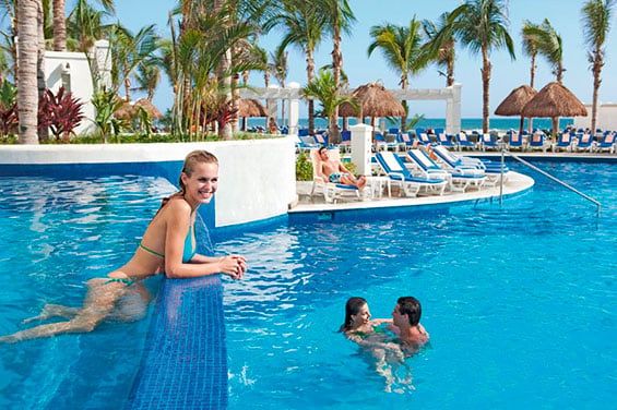Swimming pool area at Hotel Riu Emerald Bay