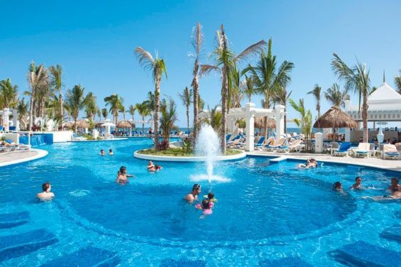 Swimming pool area at Hotel Riu Emerald Bay