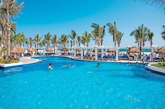 Swimming pool area at Hotel Riu Emerald Bay