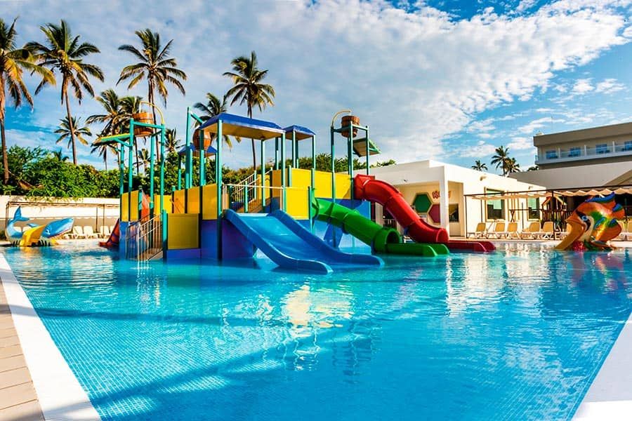 Swimming pool area at Hotel Riu Emerald Bay