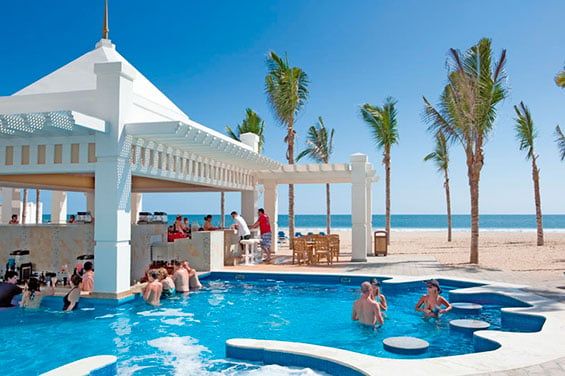 Swimming pool area at Hotel Riu Emerald Bay