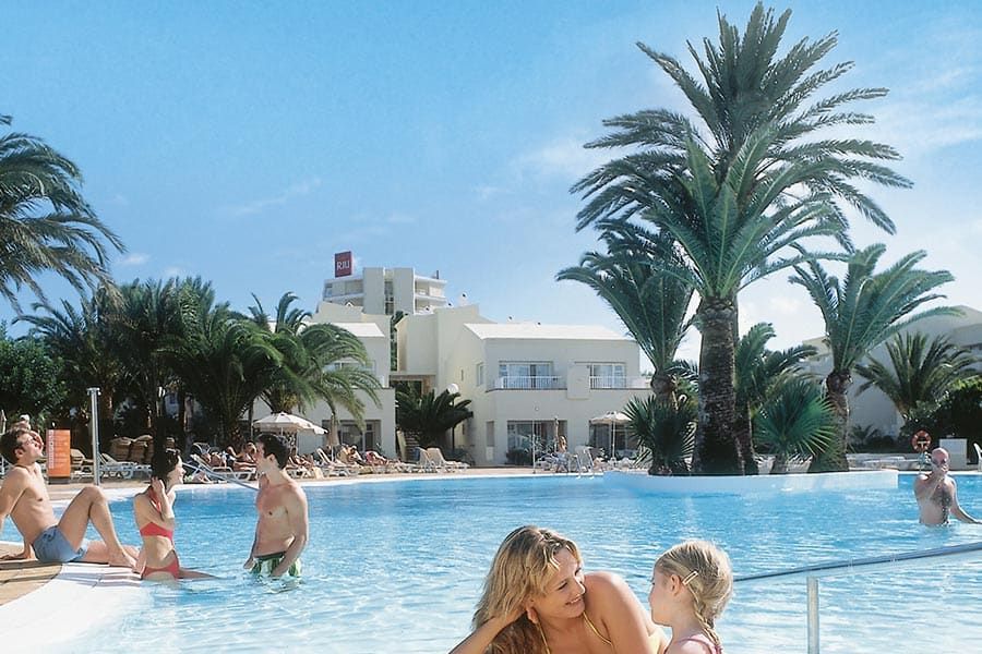 Swimming pool area at Hotel Riu Oliva Beach Resort