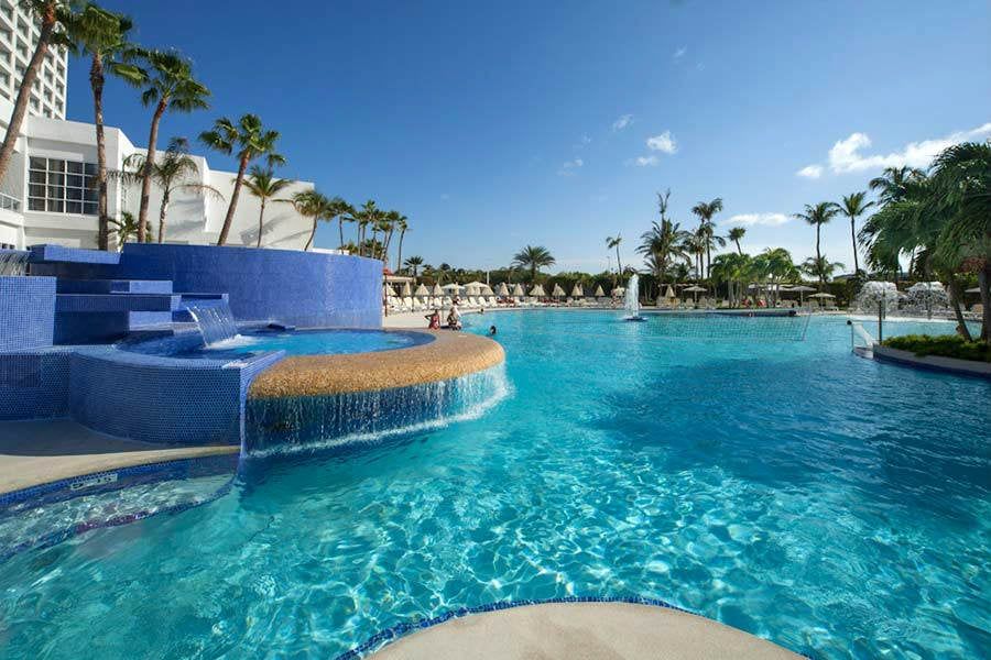 Swimming pool area at Hotel Riu Palace Antillas