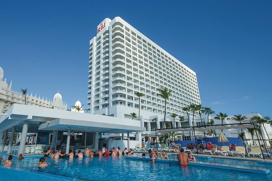 Swimming pool area at Hotel Riu Palace Antillas