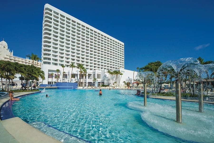 Swimming pool area at Hotel Riu Palace Antillas