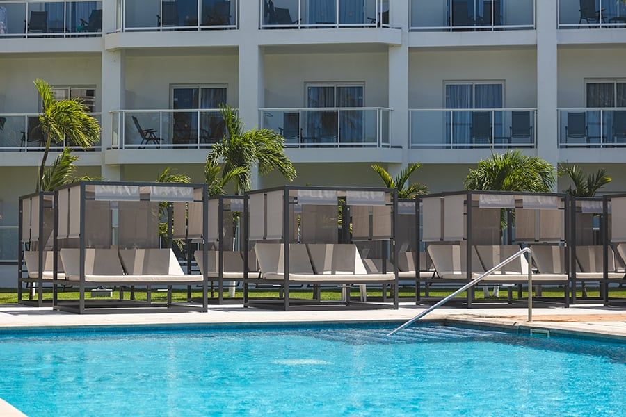 Swimming pool area at Hotel Riu Palace Antillas