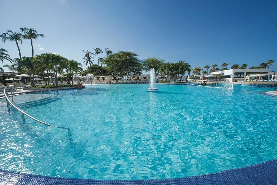 Swimming pool area at Hotel Riu Palace Antillas