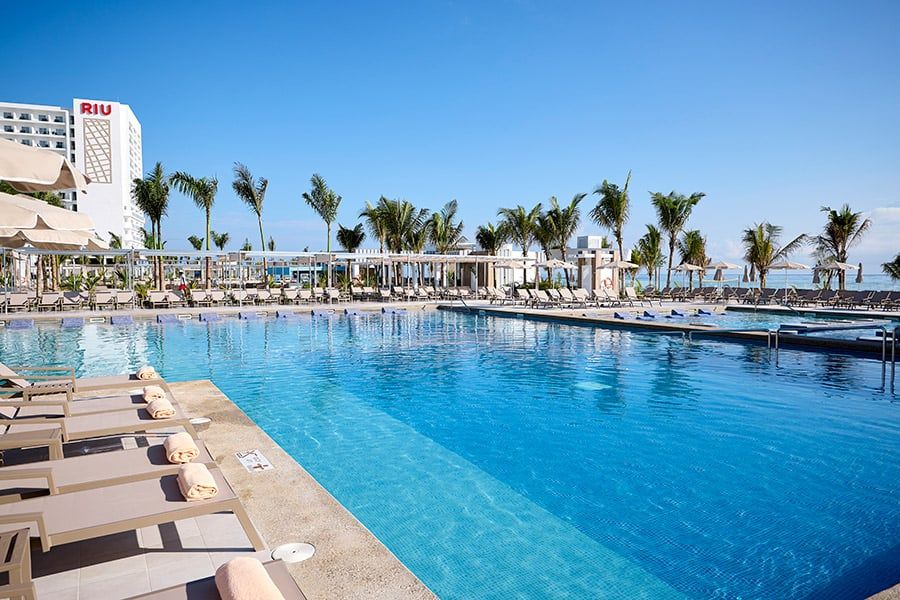Swimming pool area at Hotel Riu Palace Aquarelle