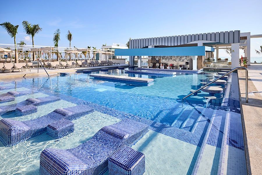 Swimming pool area at Hotel Riu Palace Aquarelle