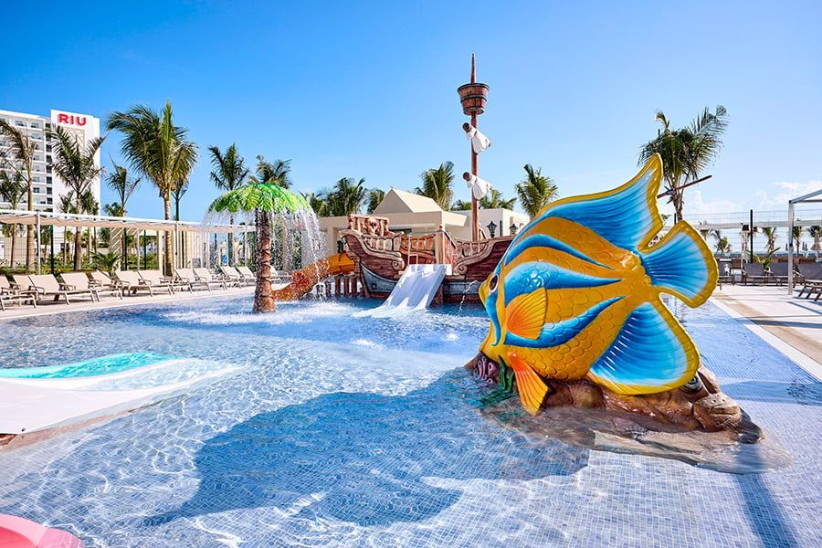Swimming pool area at Hotel Riu Palace Aquarelle
