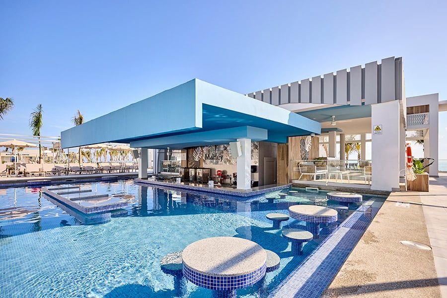 Swimming pool area at Hotel Riu Palace Aquarelle