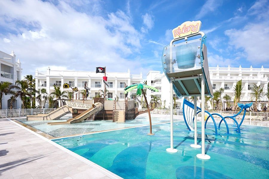 Swimming pool area at Hotel Riu Palace Bavaro