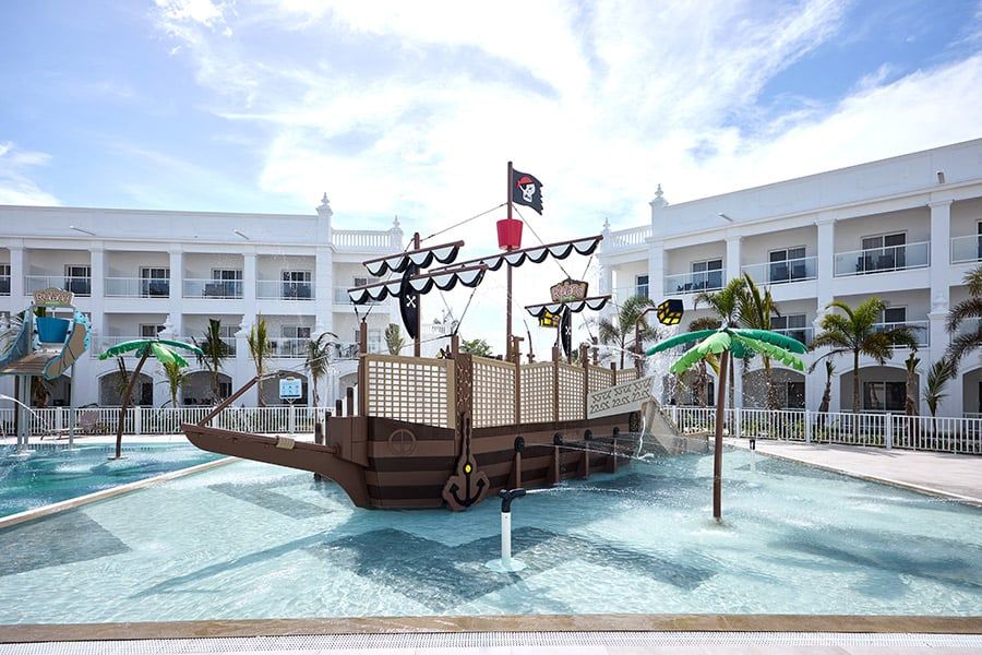 Swimming pool area at Hotel Riu Palace Bavaro