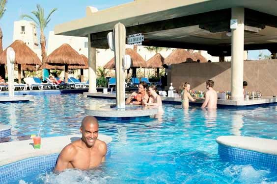 Swimming pool area at Hotel Riu Palace Costa Mujeres