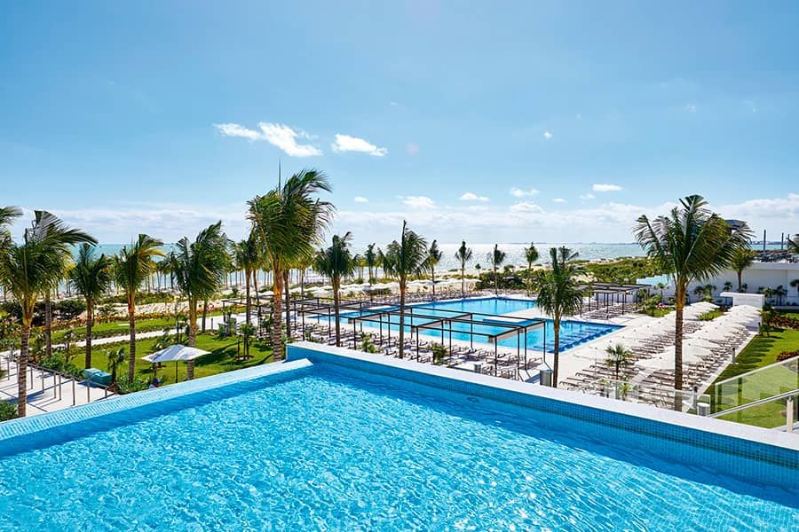 Swimming pool area at Hotel Riu Palace Costa Mujeres