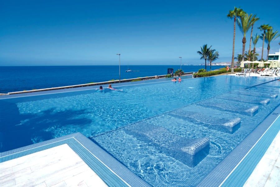 Swimming pool area at Hotel Riu Palace Meloneras