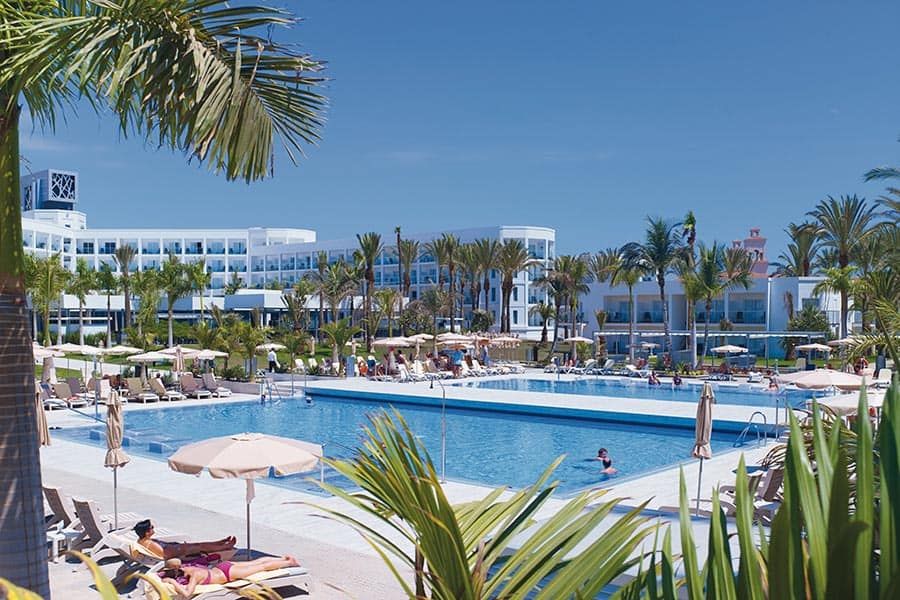 Swimming pool area at Hotel Riu Palace Meloneras