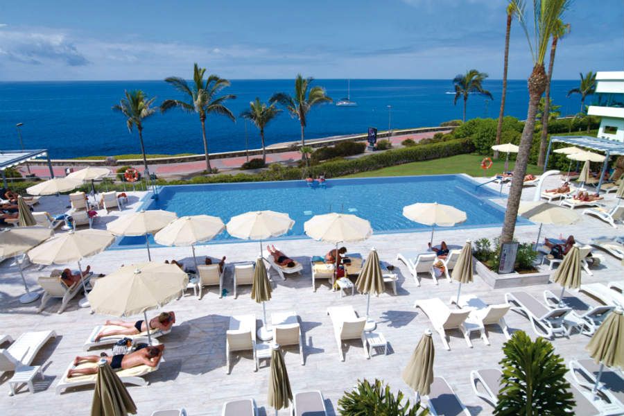 Swimming pool area at Hotel Riu Palace Meloneras