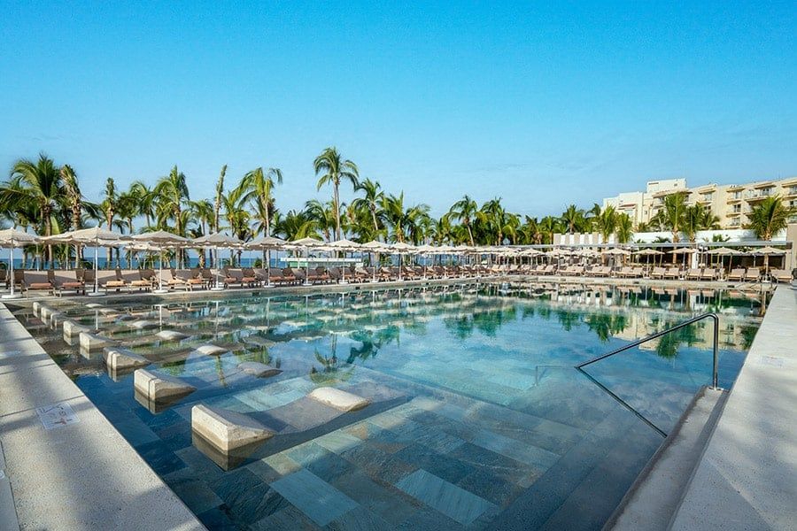 Swimming pool area at Hotel Riu Palace Pacifico