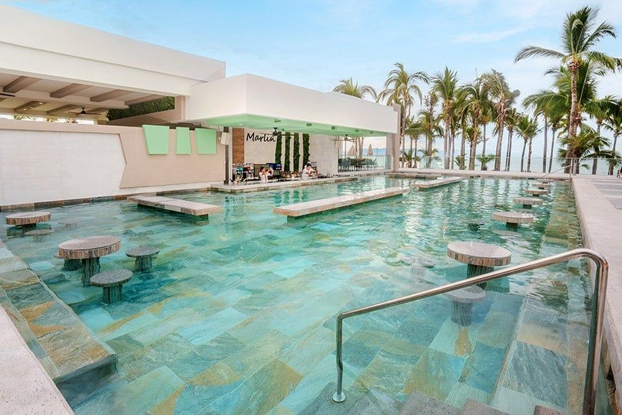 Swimming pool area at Hotel Riu Palace Pacifico