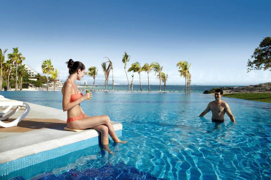 Swimming pool area at Hotel Riu Palace Peninsula
