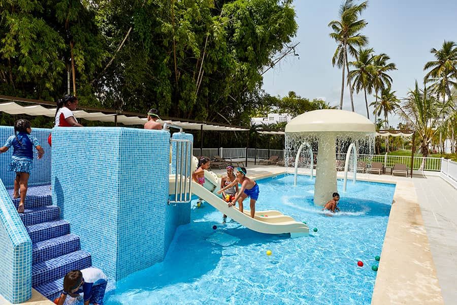 Swimming pool area at Hotel Riu Palace Punta Cana