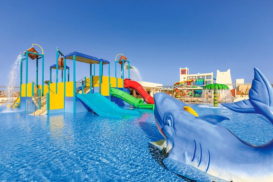 Swimming pool area at Hotel Riu Palace Santa Maria