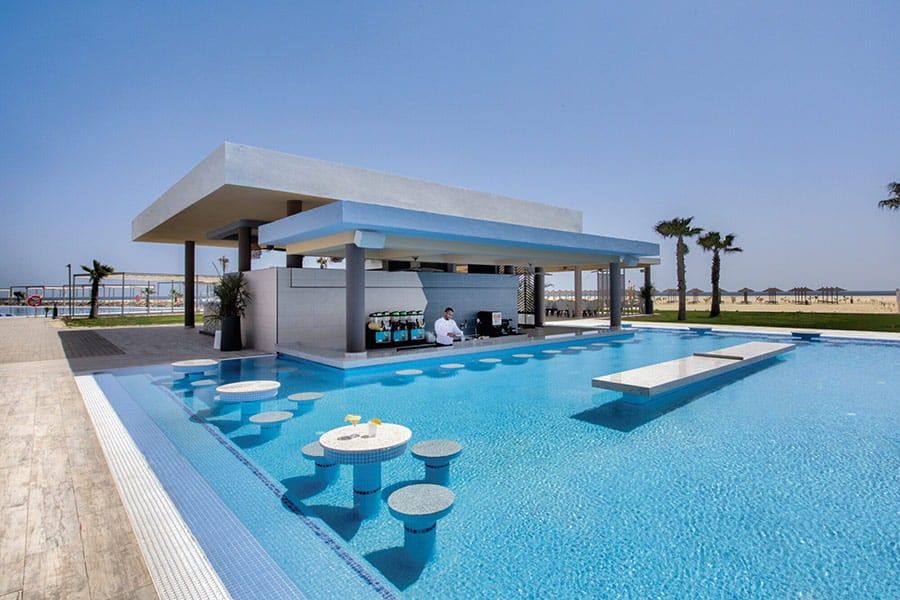 Swimming pool area at Hotel Riu Palace Santa Maria