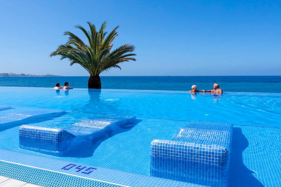 Swimming pool area at Hotel Riu Palace Tenerife
