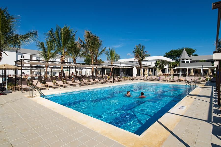 Swimming pool area at Hotel Riu Palace Tropical Bay