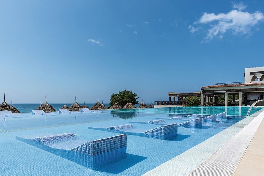 Swimming pool area at Hotel Riu Palace Zanzibar