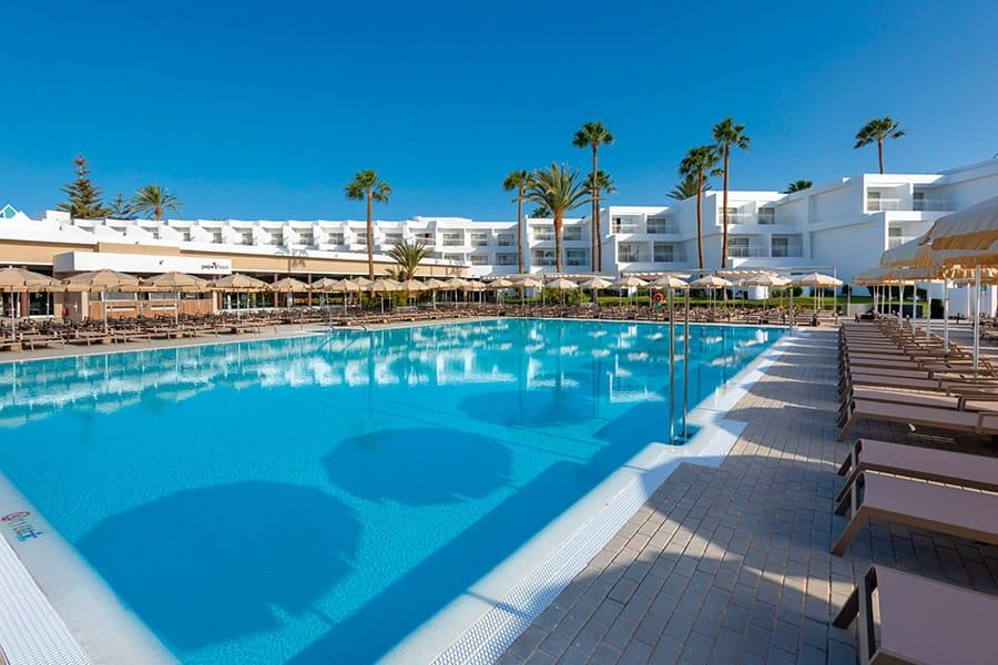 Swimming pool area at Hotel Riu Paraiso Lanzarote