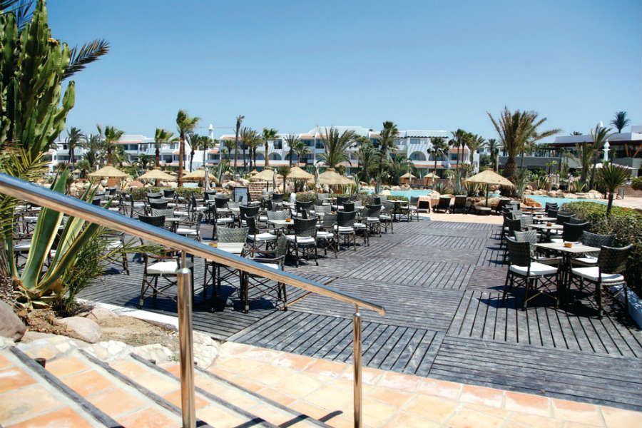 Swimming pool area at Hotel Riu Tikida Dunas